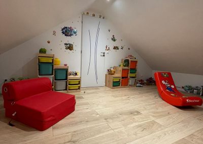 Transformation d’un comble perdu en Loire-Atlantique avec un procédé Optimum sur charpente américaine en W bois avec une pente de 35° (44260 Savenay)
